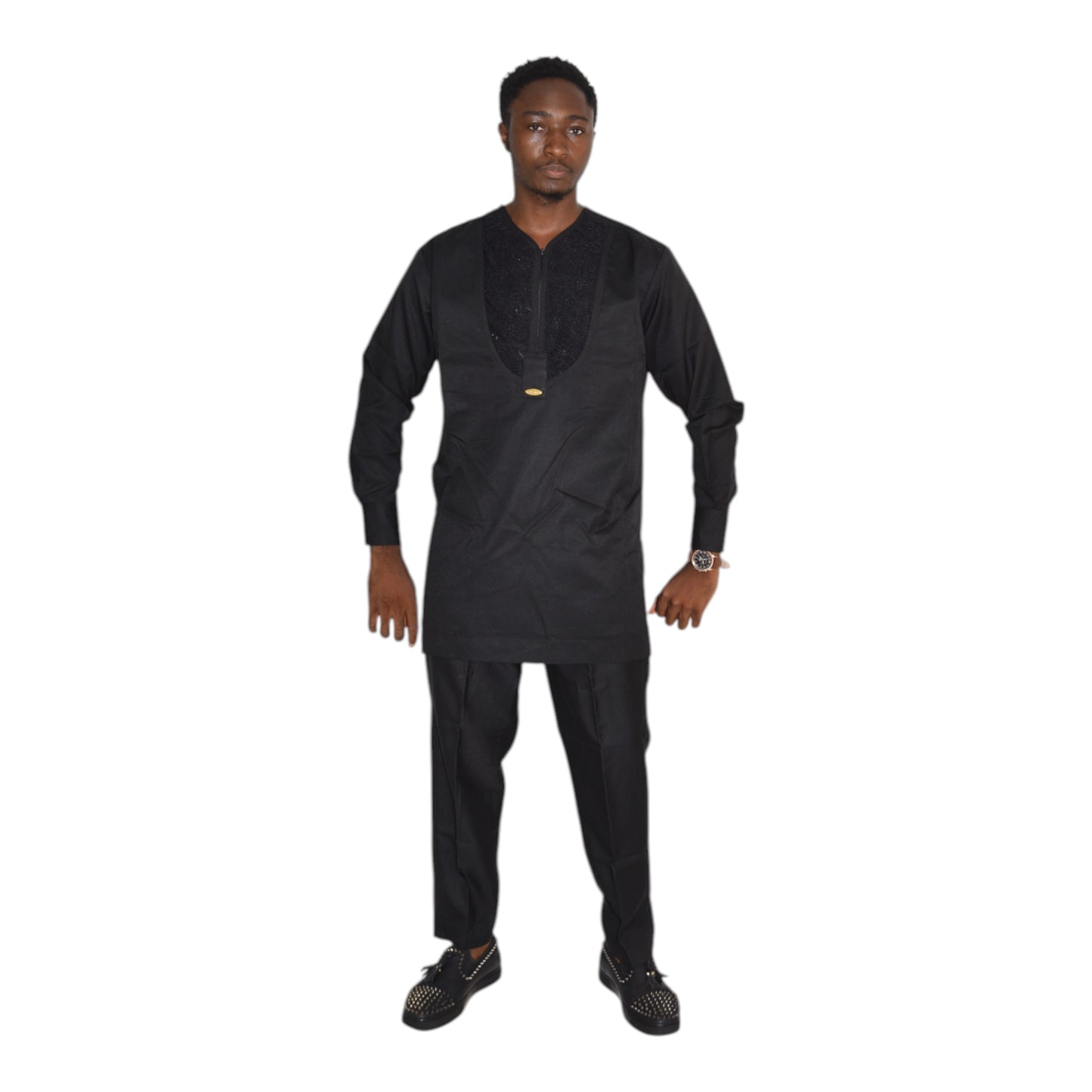 Model wearing black African senator outfit tailored from fine fabric