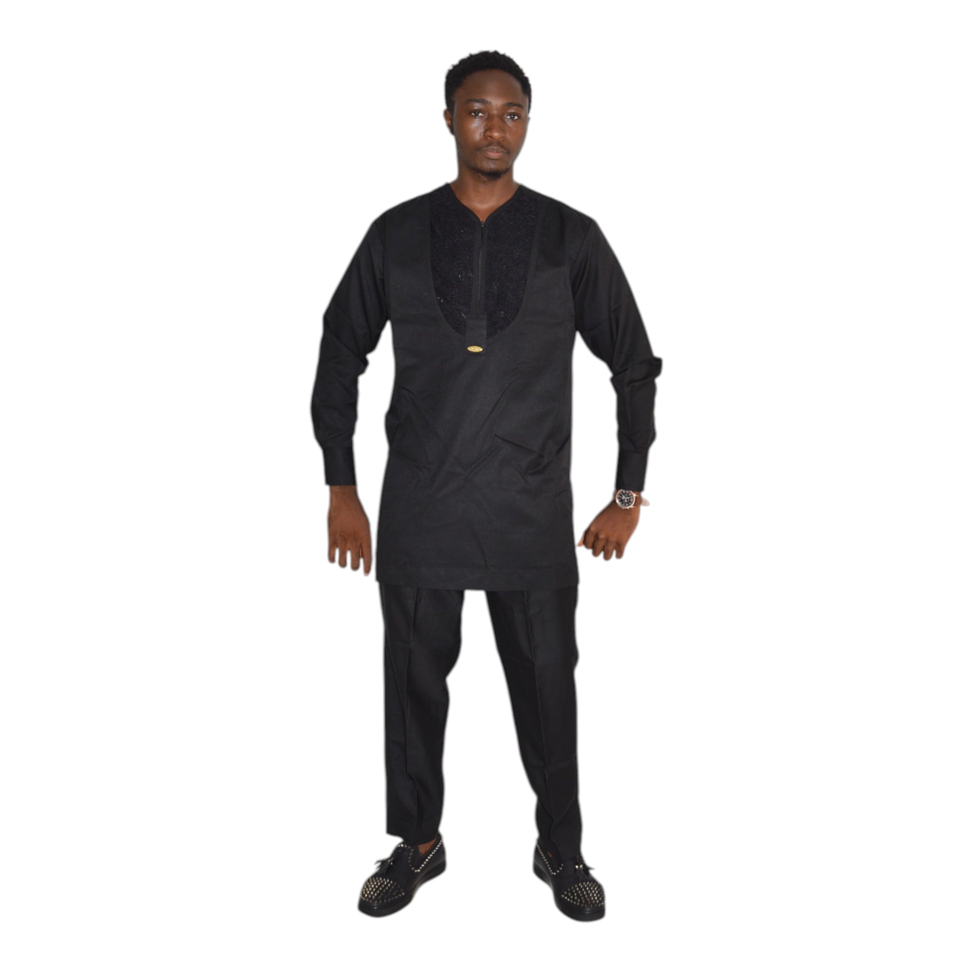 Model wearing black African senator outfit tailored from fine fabric
