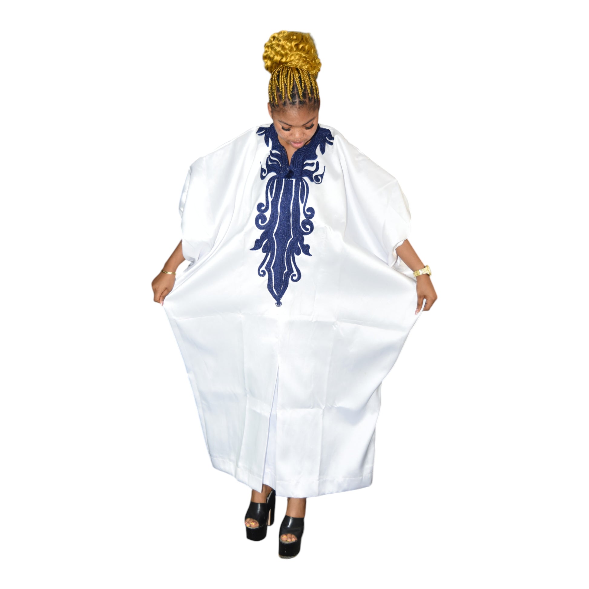 Model wearing white African gown – Afritude fine fabric collection